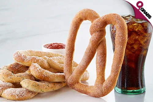 For QR25 Discover Deliciously Fun Food at PretzelMaker & Barrister's Coffee - Choose from unique Pretzels, Drinks & More! (QR50 Value)